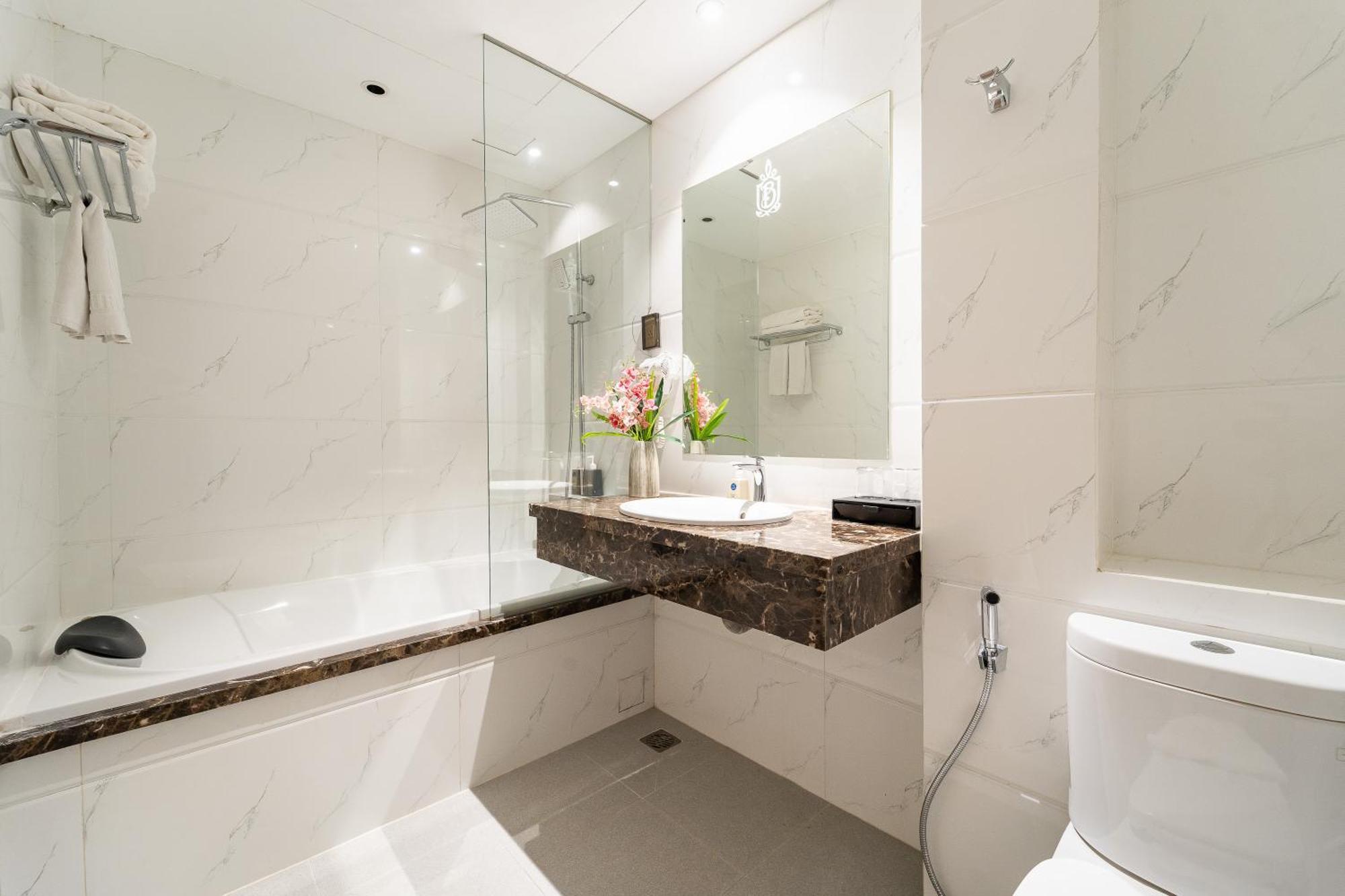 Nicecy Hotel Suites & Spa Ciudad Ho Chi Minh  Habitación foto